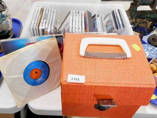 CDs and records, to include Neil Young, The Eagles, Tom Petty and the Heartbreakers, and Led...
