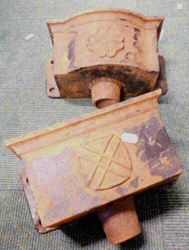 Two cast iron drain hoppers.