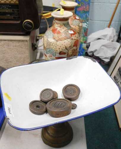 A set of gold painted kitchen scales, with weights and blue and white enamel bowl, together with...