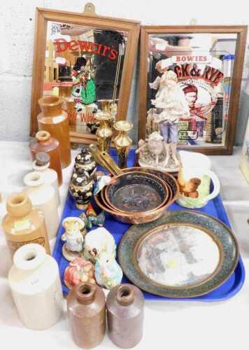 Various earthenware bottles, together with a Dewars Scotch Whisky mirror, set of graduated...