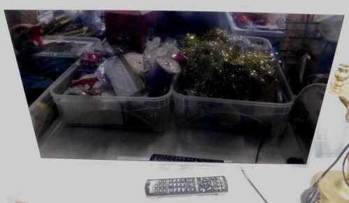 A Panasonic 32" flat screen television.