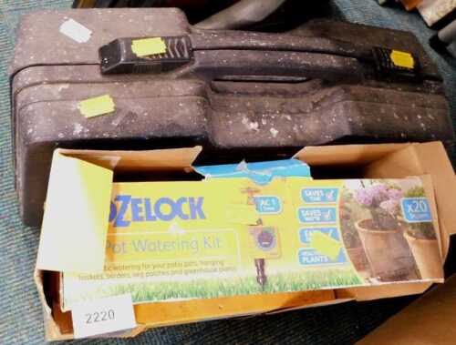 A Hozelock twenty pot watering kit, together with a JCB power drill, cased.