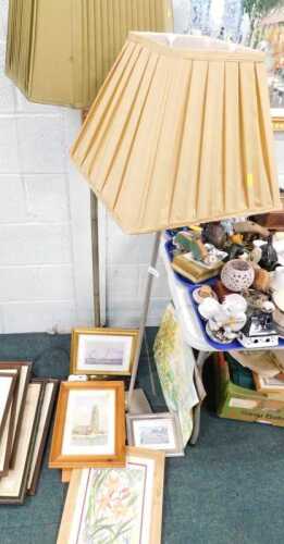 A brushed stainless steel floor lamp, with folded cream shade, together with a brass effect...