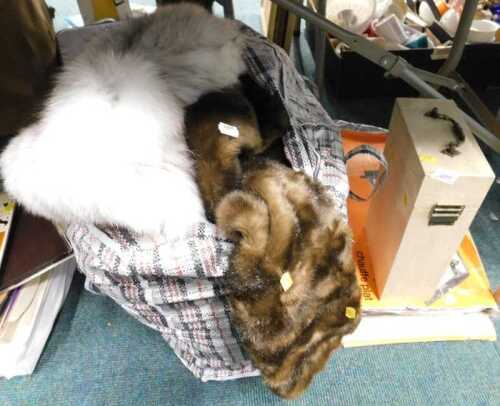 Fur coats, together with a boxed warming plate, and a wine storage box.