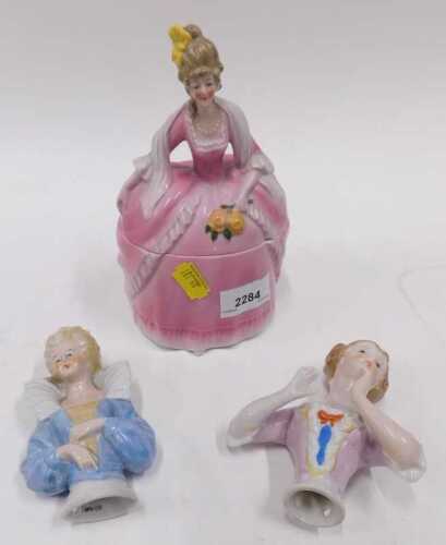 A mid century powder jar in the form of a Regency style lady, together with two further pottery...