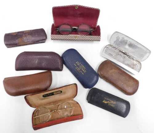 Various mid 20thC spectacles, in cases.
