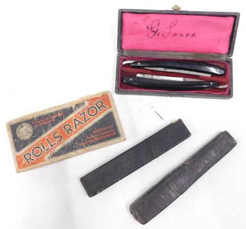 A boxed Rolls razor, and various other cut throat razors.