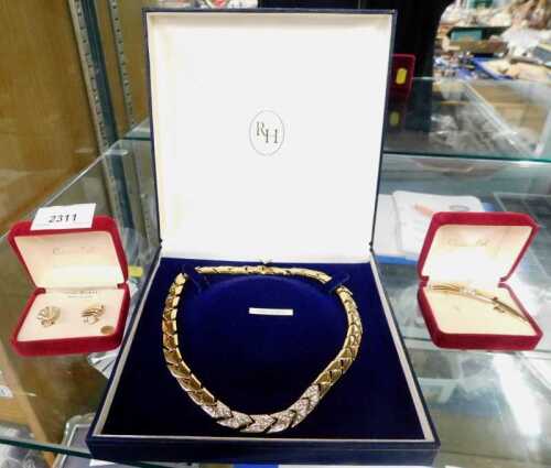 Costume jewellery, to include a pair of gold plated earrings, brooch, and necklace.