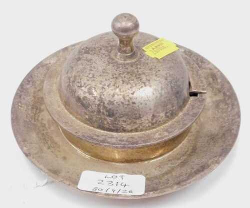 A silver plated butter dish.