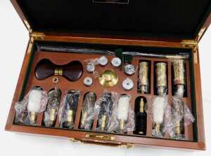 A late 20thC William Powell Gun & Rifle Makers gun cleaning kit, in a mahogany case of... - 2