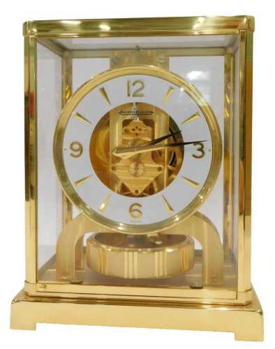 A 20thC Jaeger-LeCoultre Atmos clock, in a gilt brass and glazed case, of rectangular form, with...