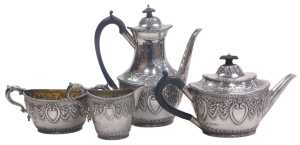 A Victorian silver four piece tea and coffee service, embossed with acanthus leaves, bow tied...