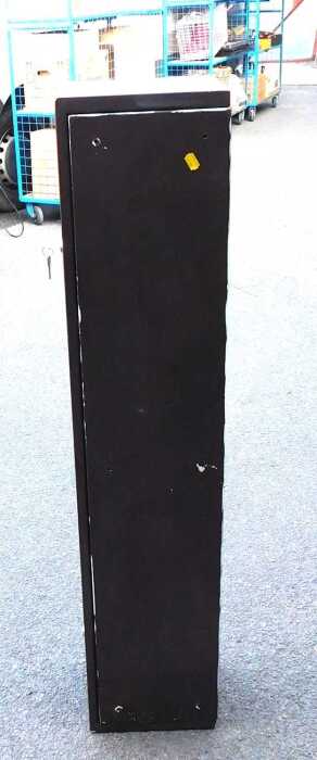 A gun cabinet, with double lock closure, and keys, 123cm high.