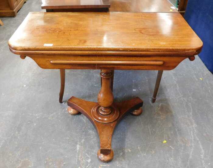 A Victorian mahogany card table, the lift over top with a rounded edge, with a baize inset panel,...