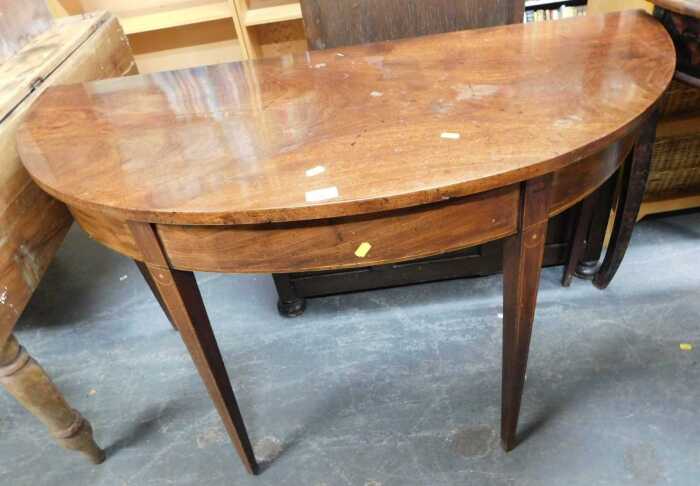 A 19thC mahogany D end table, with line inlay, raised on square tapering legs, 72cm high, 111cm...