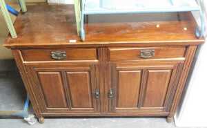 A late 19thC mahogany side cabinet, with two frieze drawers above two panelled cupboard doors,...