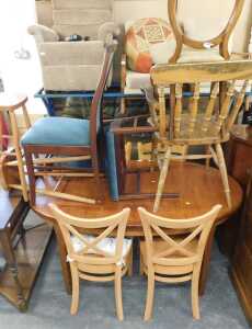 A group of furniture, to include extending dining table, two beech dining chairs, further chairs,...