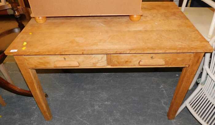 An oak table, the rectangular top above two frieze drawers, raised on square tapering legs, 78cm...