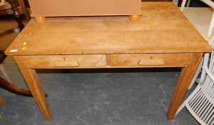 An oak table, the rectangular top above two frieze drawers, raised on square tapering legs, 78cm...