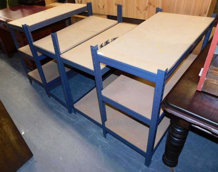 A quantity of metal framed shelving, in four sections.