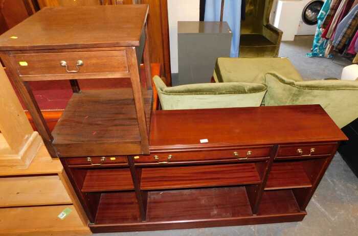 A mahogany and line inlaid open bookcase, the moulded top above three drawers, with shelves...