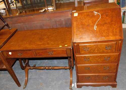 A burr walnut bureau, of small proportion, the fall enclosing a single drawer and recesses,...