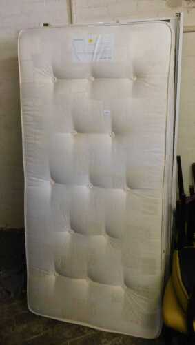 A single bed, with pullout bed beneath, together with two John Lewis Riley mattresses.