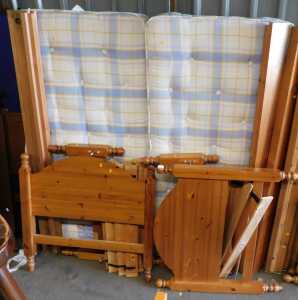 Two pine bed frames, together with slats, side rails, and mattresses.