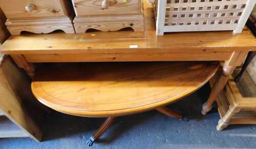 A pine dining table, raised on turned legs, 73cm high, the top 134cm x 70cm, together with a yew...