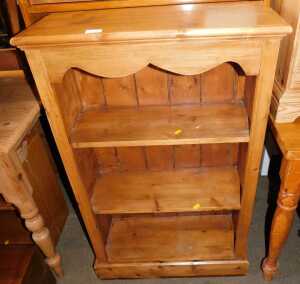 A pine open bookcase, 103cm high, 65cm wide, 27cm deep.