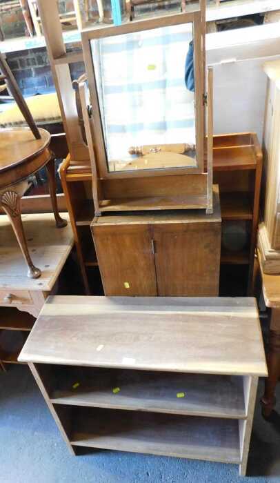 A group of furniture, comprising an oak open bookcase, swing frame mirror, pine hanging shelf,...