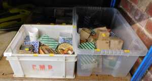 Three boxes containing screws, wood screws, etc.