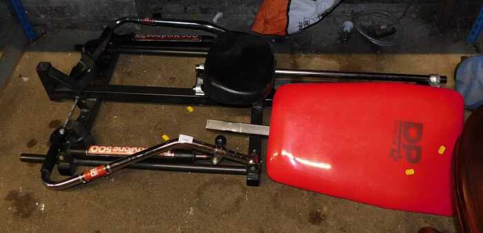 A DP Fit for Life Body Tone 500 exercise machine, together with various golf clubs.
