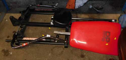 A DP Fit for Life Body Tone 500 exercise machine, together with various golf clubs.
