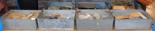 Various galvanised metal containers, containing door furniture, to include handles, door knobs,...