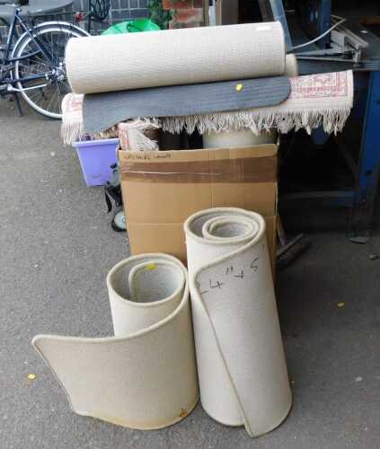 Various small carpet runners and mats.
