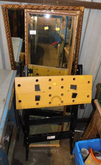 A Workmate, together with various mirrors, and tools.