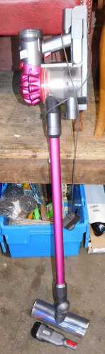 A Dyson motor head portable vacuum cleaner.