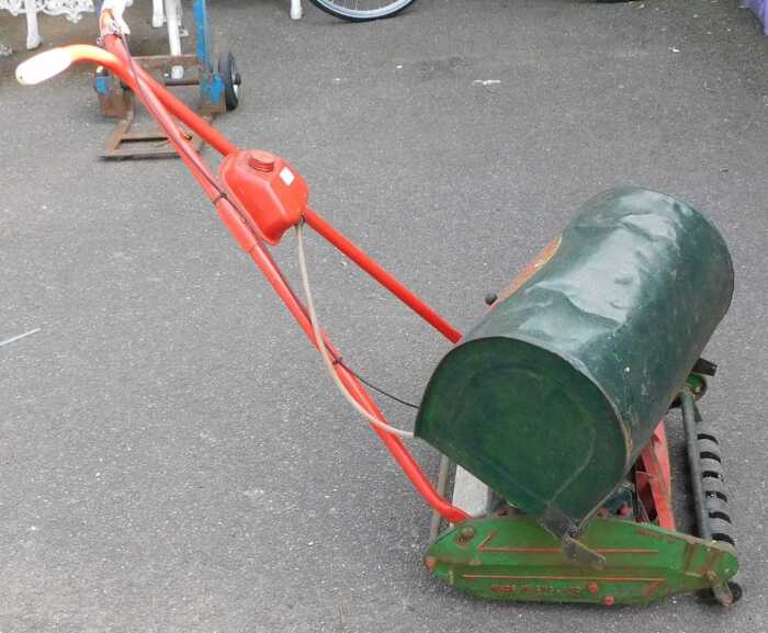 A Suffolk Super Punch dual drive push mower.