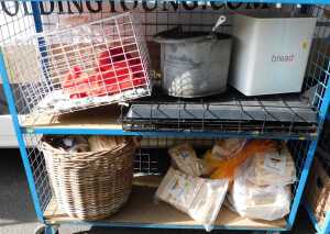 Two animal crates, together with a galvanised metal mop bucket, a bread bin, together with...