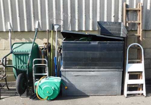 Garden effects, to include wheelbarrow, tools, two plastic storage boxes, ladders, etc. (a...