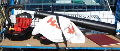 A Homelite leaf blower, model number HBL26BV.