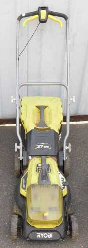 A Ryobi battery operated lawn mower.
