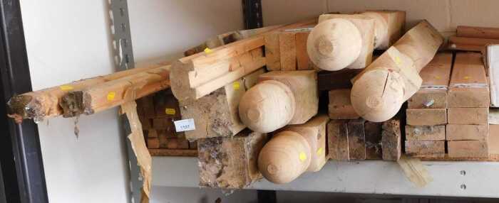Various turned and carved wooden newel posts, together with stair spindles, other wood offcuts,...