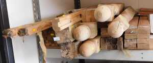 Various turned and carved wooden newel posts, together with stair spindles, other wood offcuts,...