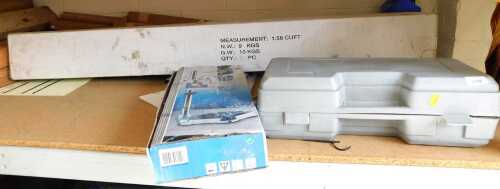 A car jack, boxed, together with a boxed drill stand, and a folding gazebo, boxed.