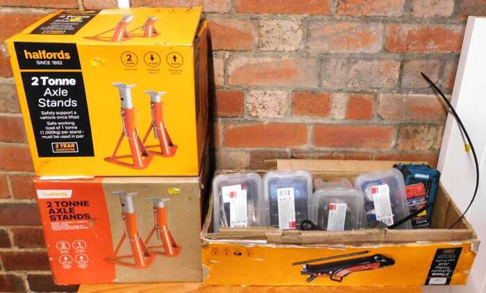 Two sets of two one tonne axle stands, each boxed, together with a box of miscellaneous parts...
