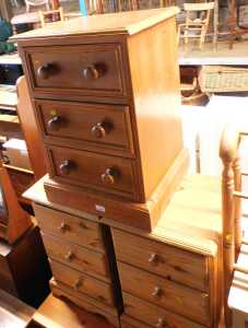 A pair of pine bedside tables, with a moulded top and three drawers below, on bracket feet, and...