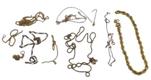 A group of neckchains, and partial neckchains, yellow metal, various marks, 10.9g.
