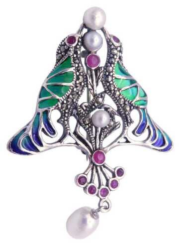 An Art Nouveau style plique-a-jour marcasite pearl and ruby paste pendant brooch, in white metal,...